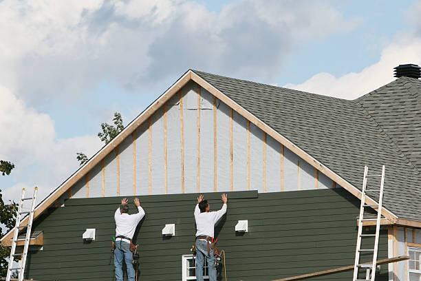 Professional Siding Contractor technician working in Warnock, OH